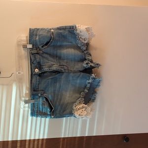 Lace trimmed denim shorts